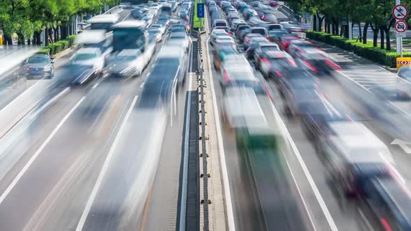 Time lapse of busy traffic and modern buildings in Beijing city , China.