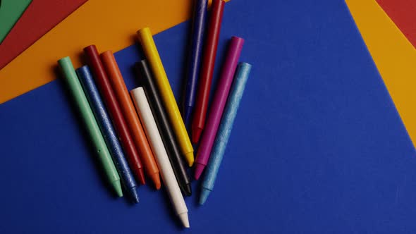 Rotating shot of color wax crayons for drawing and crafts 