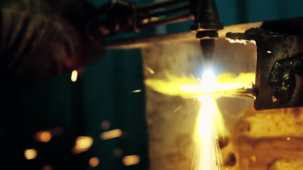 Welder welding a metal