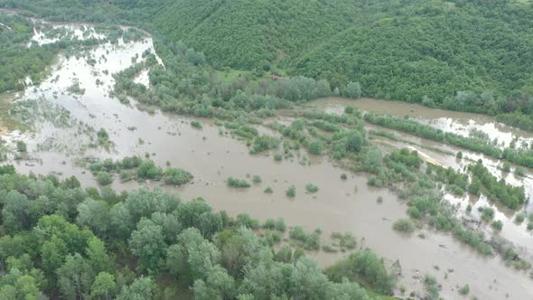 Flooding of forest and fertile soil after heavy raining 4K drone video