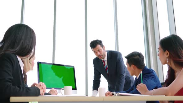 Business People in the Conference Room with Green Screen