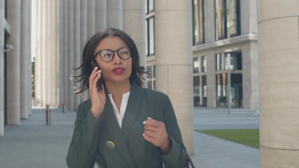 Businesswoman Having Telephone Talk Outdoors