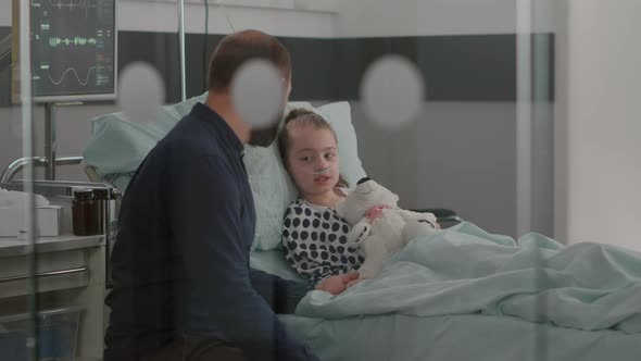 Father Holding Sick Daughter Hand Explaining Medication Treatment Against Medical Sickness