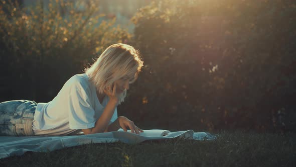 Young girl reading a book