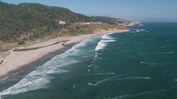 Aerial Drone Shot of a Beach Kiteboarders and Windsurfers (Waddell Beach, Pacific Coast Highway, CA)