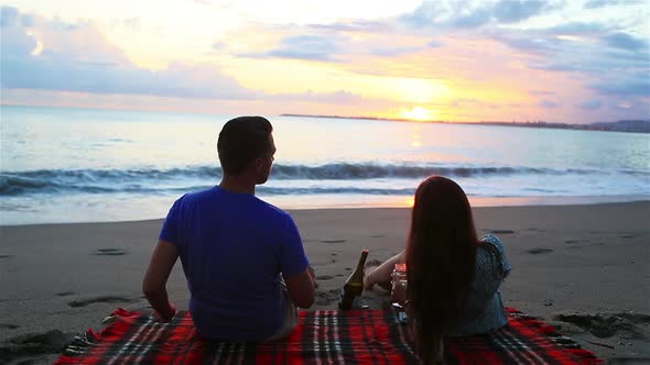 Family Having a Picnic on the Beach