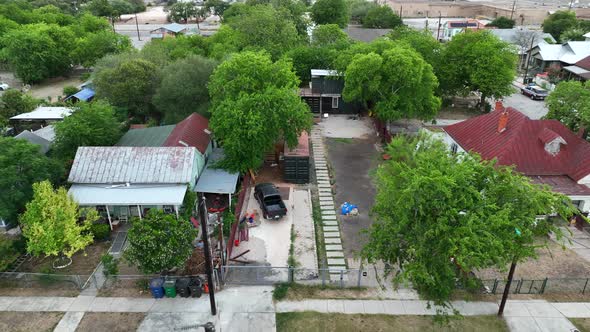 Rural homes in Southwest USA. Residential houses. Aerial truck shot. Hispanic community.