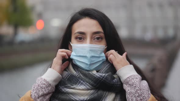 Middle Eastern Woman Take Off Her Mask and Breathe Normally. Covid Concept Health and Safety, N1H1