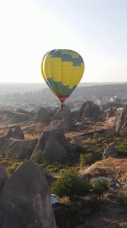 Vertical Video of Hot Air Balloons Flying in the Sky Over Cappadocia Turkey