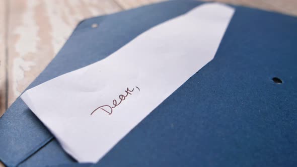 Envelope , Empty Paper and Fountain Pen on Table 