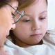 Woman encouraging girl in hospital room - VideoHive Item for Sale