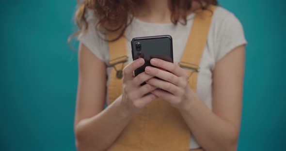 Close Up  Video of Young Woman Using a Smartphone