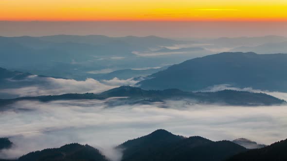 Misty Dawn in the Mountains. Beautiful Autumn Landscape