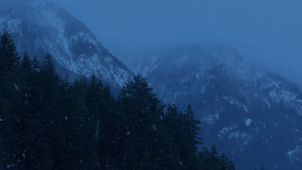 Snow Falls On Mountains In The Winter