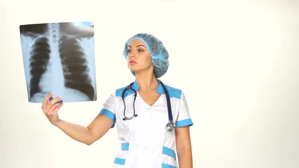 Woman Doctor Looking at X-Ray Radiography Isolated White