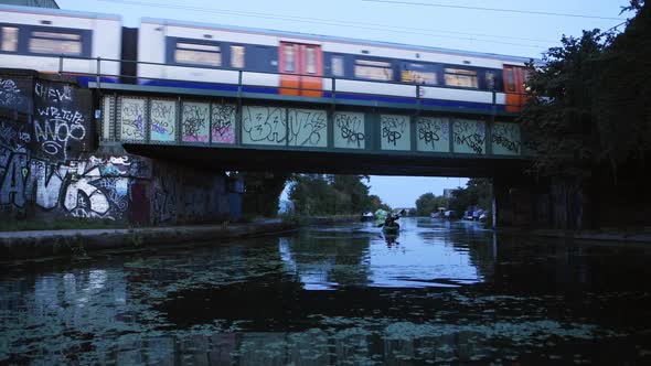 Kayaking Under Train Bridge in Central London - Blue Hour Evening View