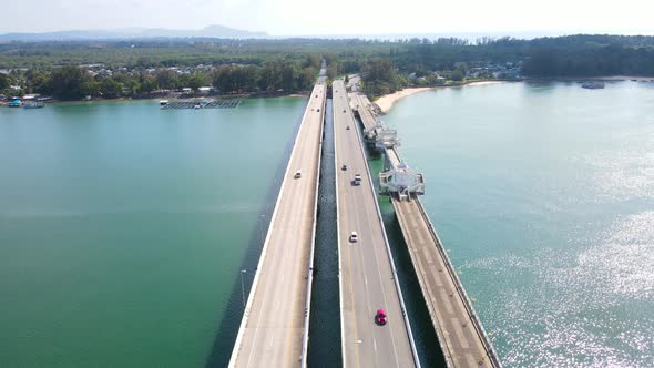 Aerial view top down view Sarasin Bridge transport over sea. Transport concept Phuket Thailand