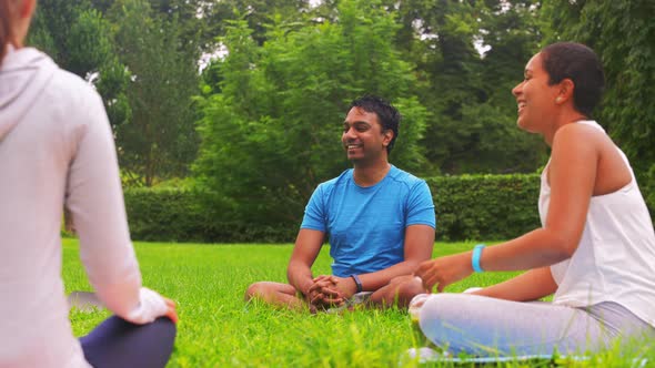 Group of People Meeting for Yoga Class at Park