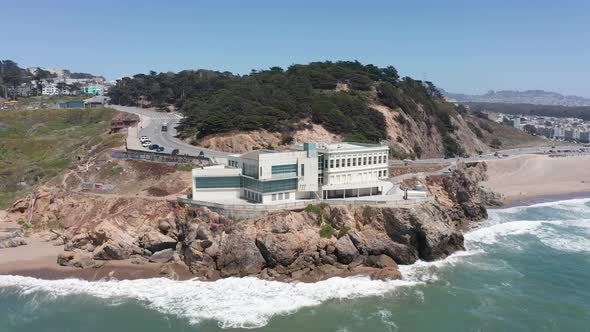 Close-up aerial panning shot of the Cliff House at Land's End in San Francisco. 4K