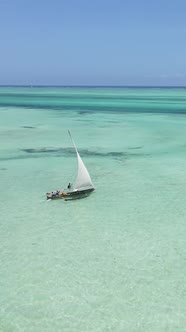 Vertical Video Boats in the Ocean Near the Coast of Zanzibar Tanzania