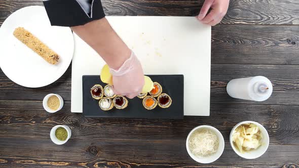 Chef Pouring Sauce Sushi