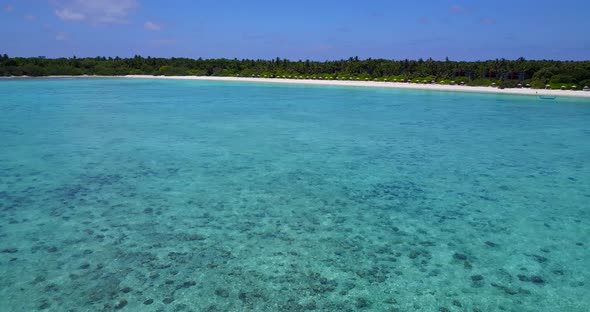 Beautiful above tourism shot of a white sandy paradise beach and blue water background in colorful 4