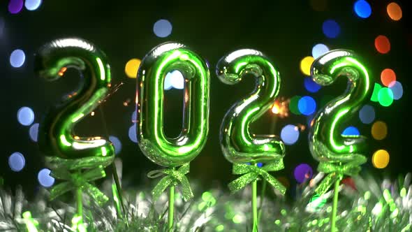 Celebrating New Year 2022 Camera Pans Around Christmas Decorations and Sparklers