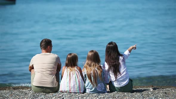 Young Family on Vacation Have a Lot of Fun