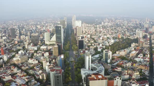 Straight Road Dividing Downtown Financial Buildings Reforma in Mexico City, Aerial