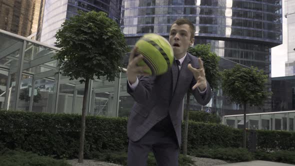 The Young Businessman Wearing Suit Quit His Office Job and Began to Play Basketball