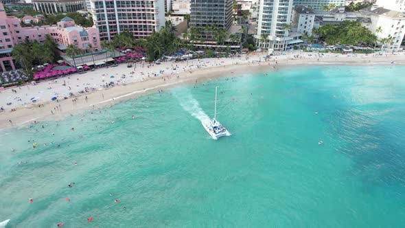 Aerial drone shot of a sunset dinner cruise departing with couples looking to enjoy dinner and drink