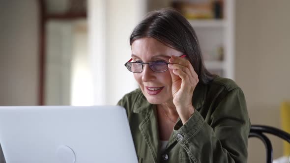 Old Elderly Successful Businesswoman Using Laptop at Home Living Room Home Office Spbi