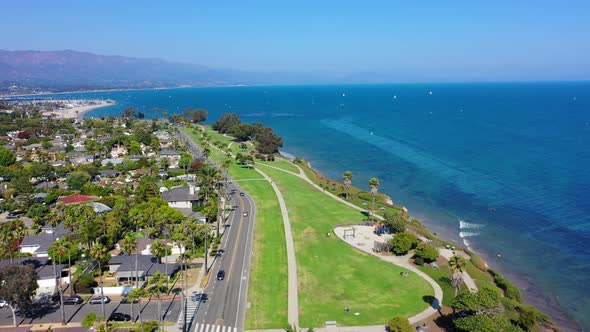 Flying over the highway with a beautiful view of the beach in Santa Barbara, California