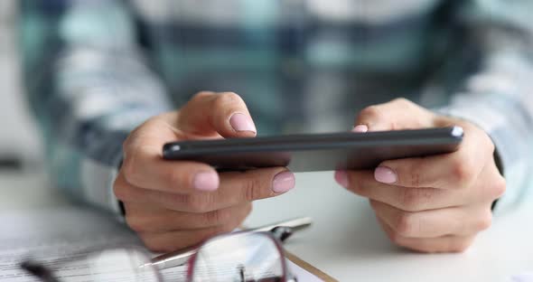 Female Hands Holding Black Smartphone and Typing  Movie