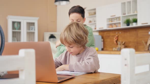 Two Boys Do Homework