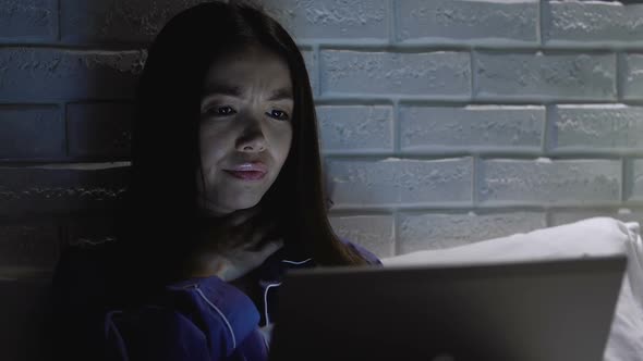 Asian Businesswoman Using Laptop at Night, Drinking Water, Freelance Overwork