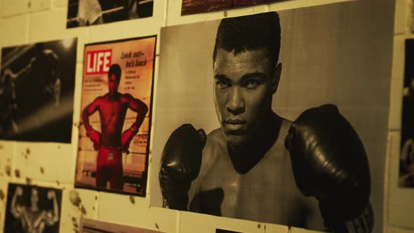 Photos of Muhammad Ali on a wall