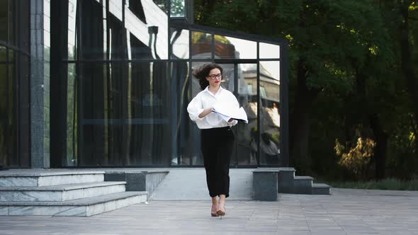 Hottempered Lady in Glasses Formal Attire and High Heels