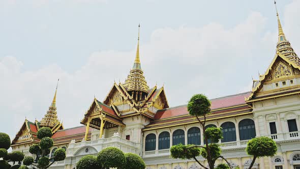 Grand Palace Complex, Bangkok, Thailand, a Beautiful Building with Colourful Roof Tiles and Gold Lea