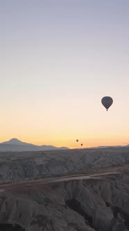 Vertical Video of Hot Air Balloons Flying in the Sky Over Cappadocia Turkey