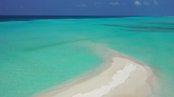 Luxury fly over island view of a white sandy paradise beach and turquoise sea background in colorful