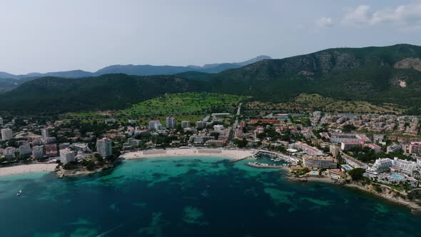 Aerial Drone Top Down Video of Small Emerald Sea Tropical Port