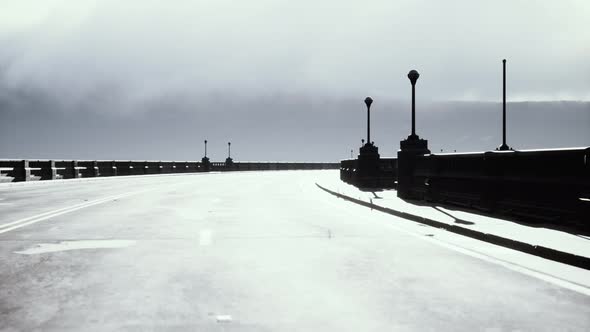 Old Empty Stone Bridge on a Foggy Day