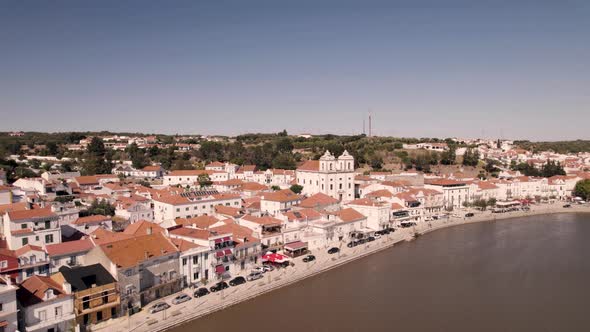Alcaçer do Sal  promenade by Sado river, Alentejo, Portugal. Beautiful cityscape. Aerial view