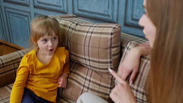 Professional Speech Therapist Woman Teaching Pronunciation Little Child Girl with Voice Problems