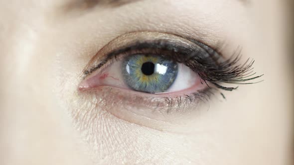 Close view of woman's blue eye