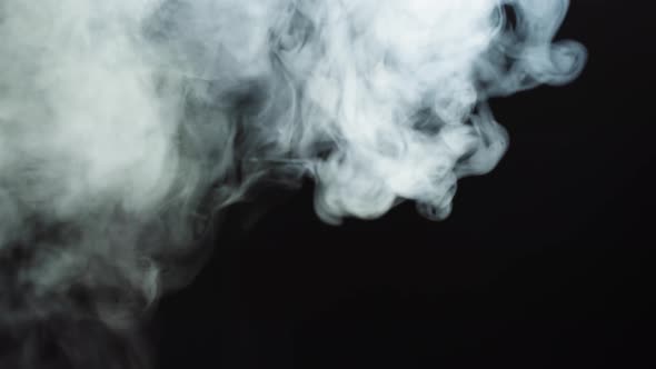 Abstract Smoke on Black Chroma Key Background