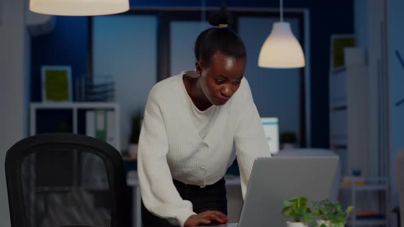 Focused Tired Business Woman Looking at Camera After Reading Mails on Laptop