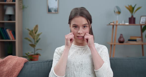 Crop View of Woman Showing with Deaf-mute Sign Language No Racism While Looking To Camera. Female