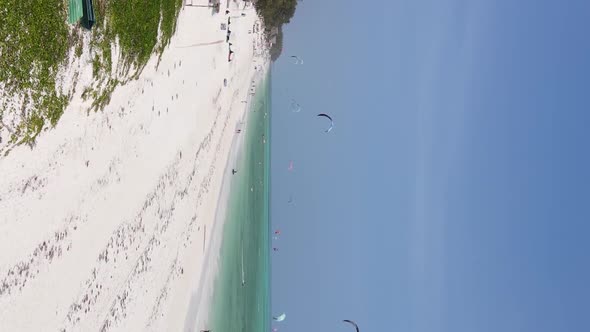 Vertical Video Boats in the Ocean Near the Coast of Zanzibar Tanzania Aerial View